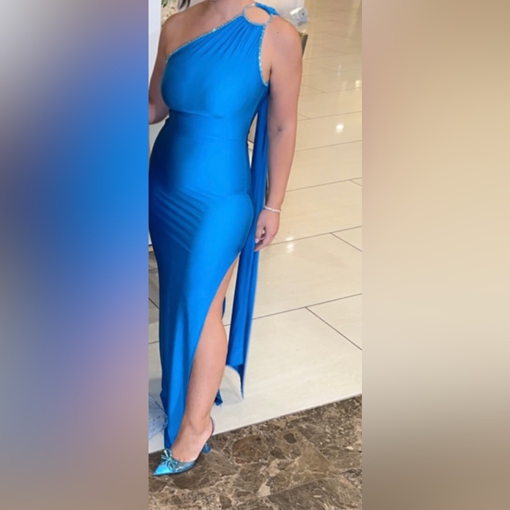 X Revolve One Shoulder Cut Out Gown in Blue
Khanums size small